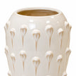 Close-up of the large ceramic bobble vase's glossy ivory glaze and raised droplet detail