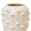 Close-up of the medium ceramic bobble vase's glossy ivory glaze and raised droplet detail