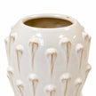 Close-up of the small ceramic bobble vase's glossy ivory glaze and raised droplet detail