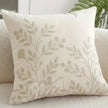 Cream floral embroidered cushion cover by Starlight Express, soft furnishings with intricate flower embroidery and plush fabric.