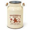 Close-up of the Gingerbread Bakery illustration, cream finish and wooden handles on the decorative urn