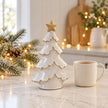 Satchville medium glazed ceramic Christmas tree with cream star topper in a kitchen setting