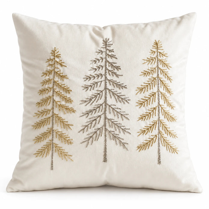 Front studio view of cream velvet cushion cover with three embroidered Christmas trees