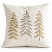 Front studio view of cream velvet cushion cover with three embroidered Christmas trees
