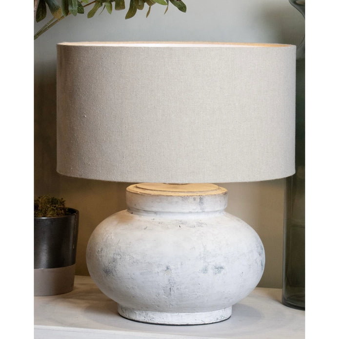 Hill Interiors Darcy squat round stone lamp, stylish lighting fixture with a smooth, rounded design and textured stone finish.