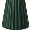 Close-up of vertical ribs and scalloped base on the dark green ceramic Christmas tree