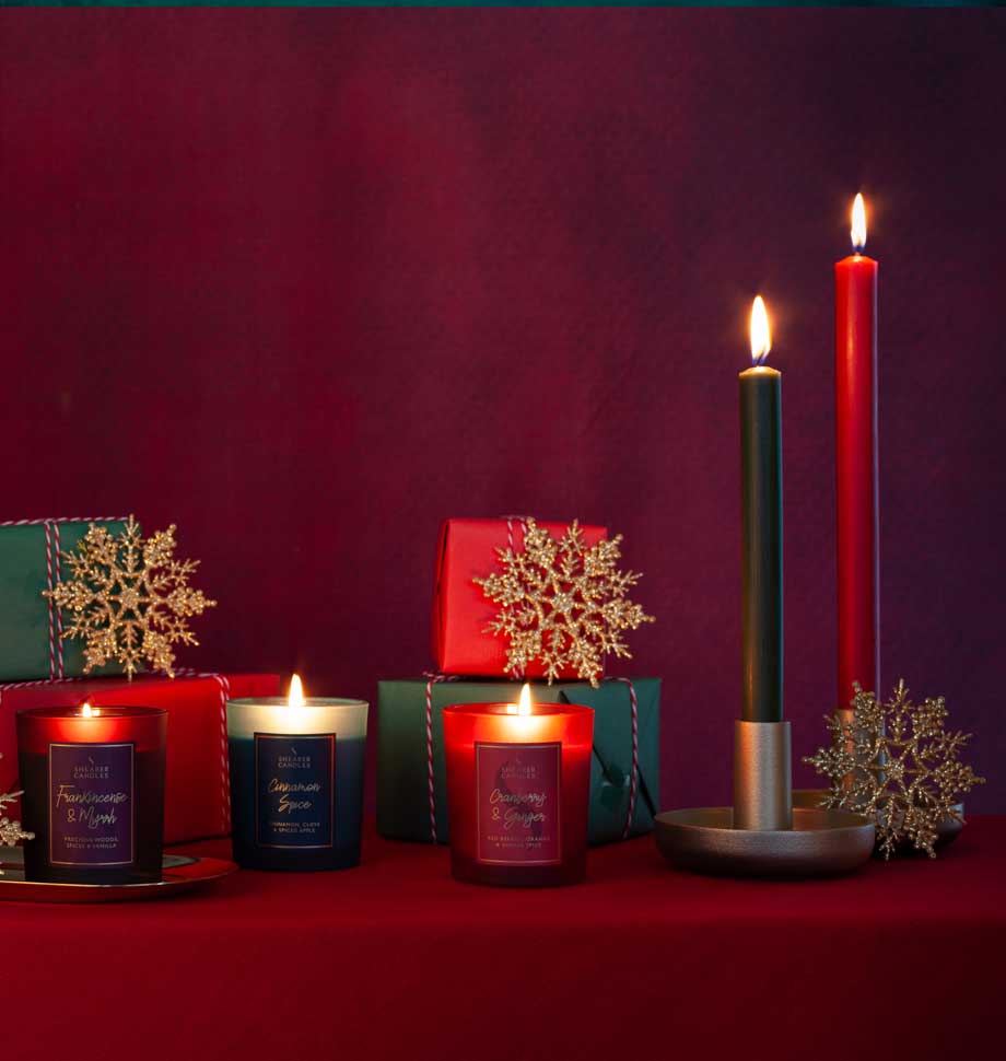 Shearer Candles Christmas jar candle with frankincense and myrrh scent in a festive glass container.
