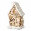 Complete decorated gingerbread house unlit on a white background