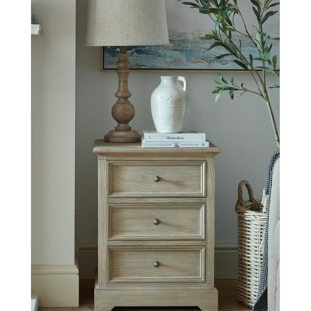 Delphine Collection 3 Drawer Bedside Chest by Hill Interiors showcasing a wooden furniture piece with sleek drawers and modern design.