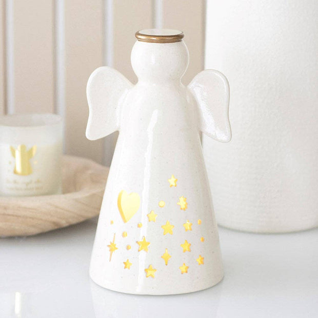 Small LED light-up angel decoration with detailed wings and glowing lights, perfect for holiday or home decor.
