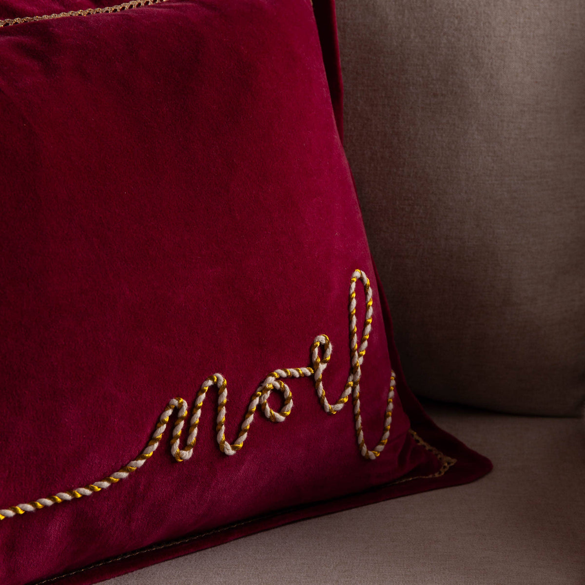 Red and gold Noel applique velvet cushion by Riva Home for Christmas décor