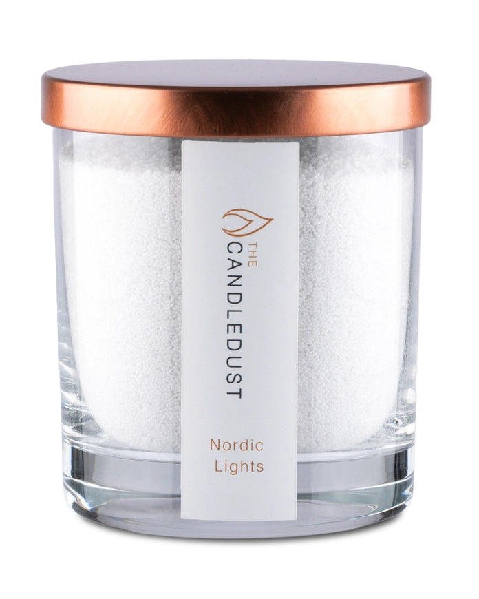 White scented candle in a sand jar from The Candledust Nordic Lights home fragrance kit, with a cozy, minimalist design.