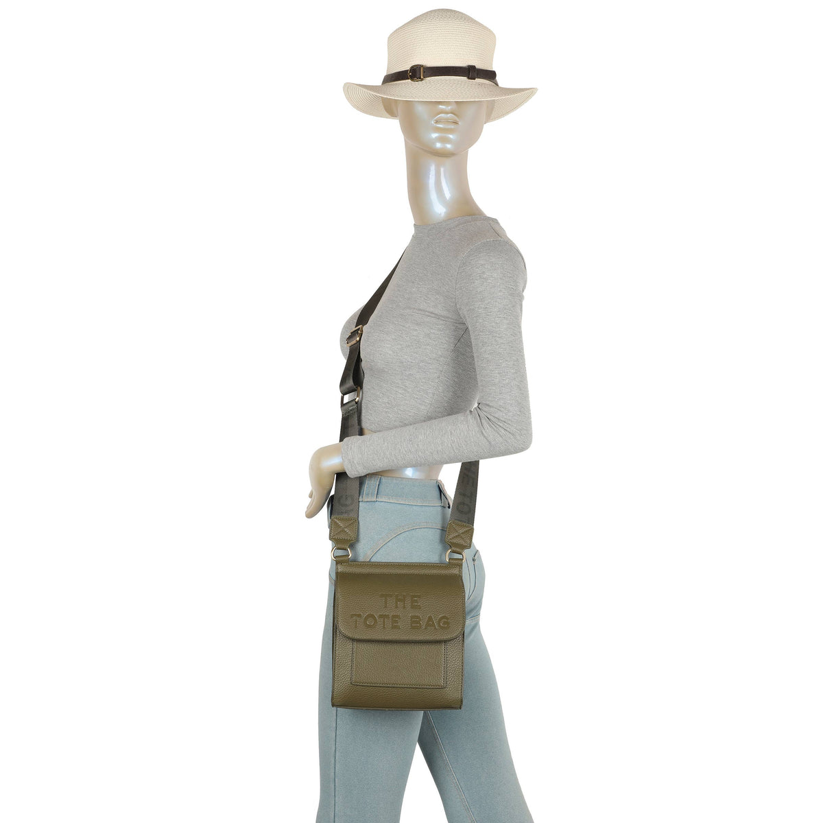 Chocolate brown Jamie Bags crossbody bag with wide strap and front pocket, shown with adjustable strap and sleek design.
