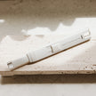 Electric Rechargeable Candle Lighter - White, white candle lighter lying on a stone surface