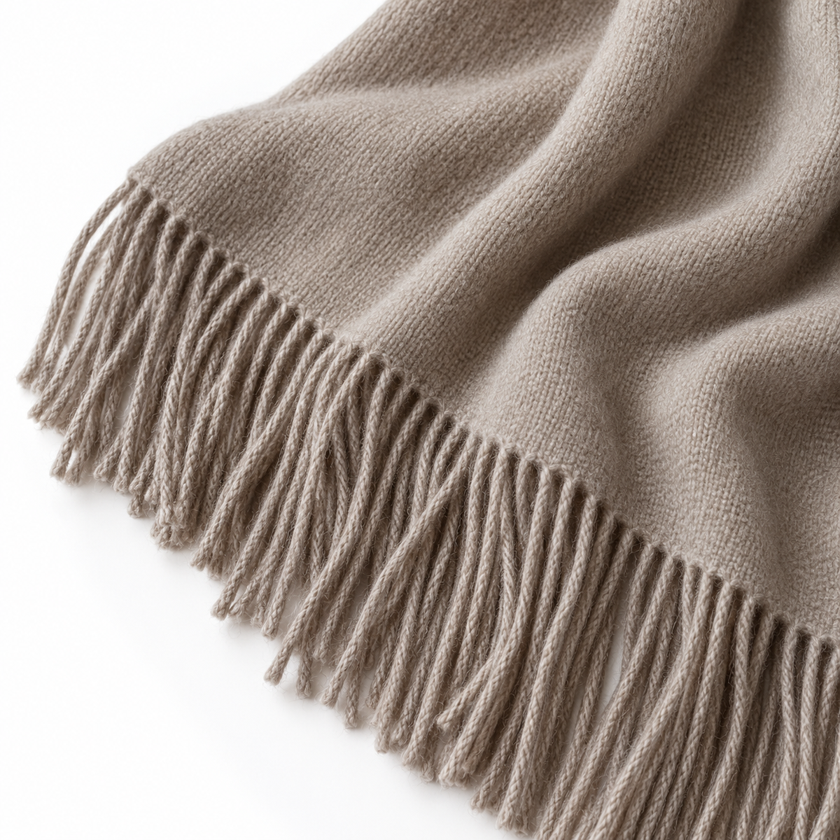 Beige and brown fine knit tasseled throw blanket by Ellenvale Trade, soft furnishings for cozy home decor.