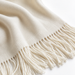 Soft, fine knit Ellenvale Della Cream luxury throw blanket from Ellenvale Trade, perfect for cozy home decor.