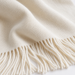 Ellenvale Della Cream soft knit luxury throw blanket with fine, plush texture, perfect for cozy home decor.