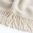 Ellenvale Della Cream luxury throw blanket with soft fine knit texture, perfect for cozy living room decor.