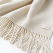 Ellenvale Della Cream luxury throw blanket with soft fine knit texture, perfect for cozy living room or bedroom decor.