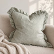 Hallie Sage Green Ruffled Edge Linen Cushion Cover – styled view 3