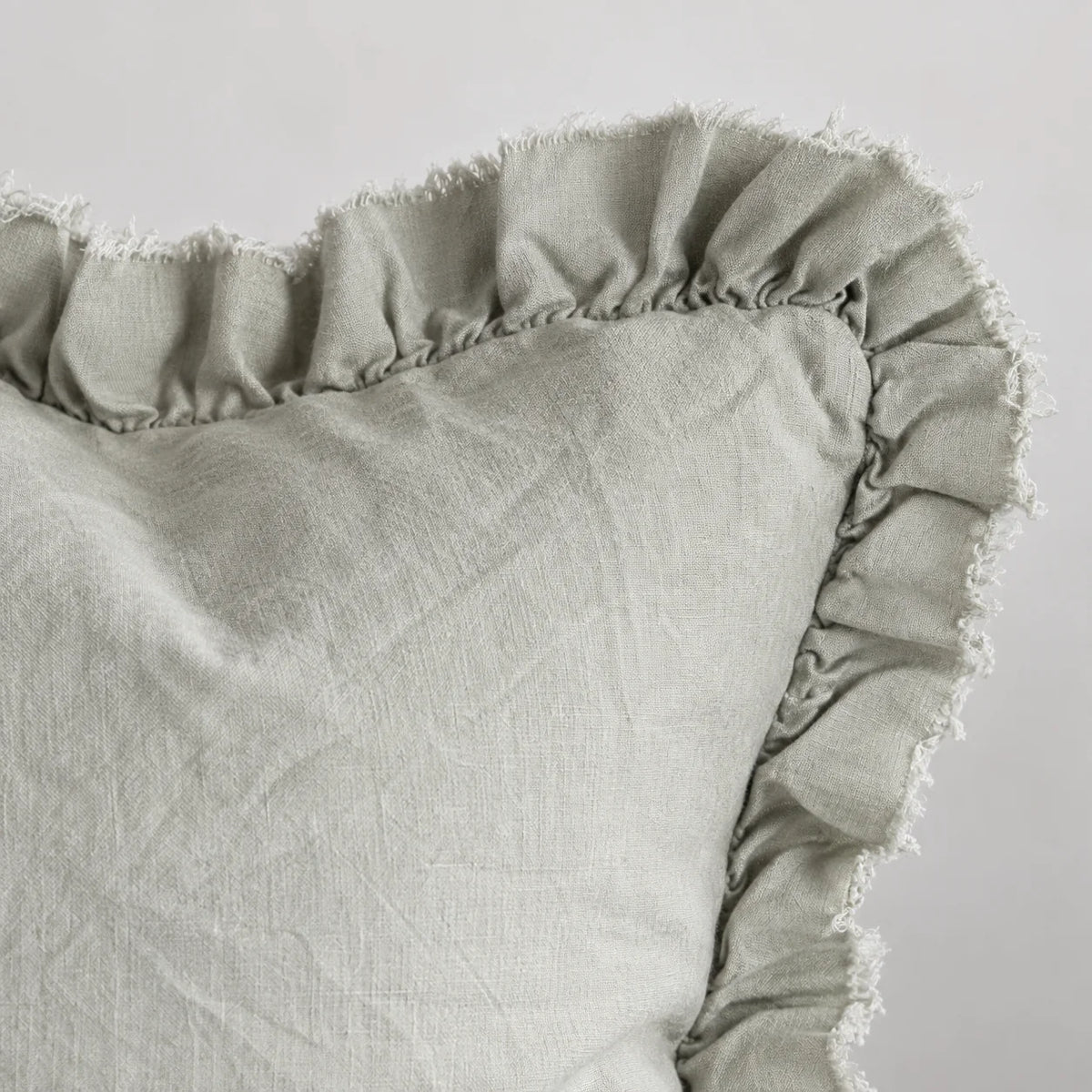 Hallie Sage Green Ruffled Edge Linen Cushion Cover – fabric detail 1
