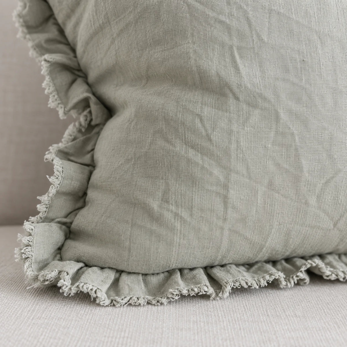 Hallie Sage Green Ruffled Edge Linen Cushion Cover – fabric detail 3