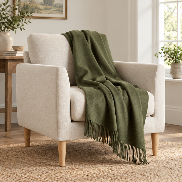Della Olive Green Fine Knit Tasselled Throw Blanket – styled view 1