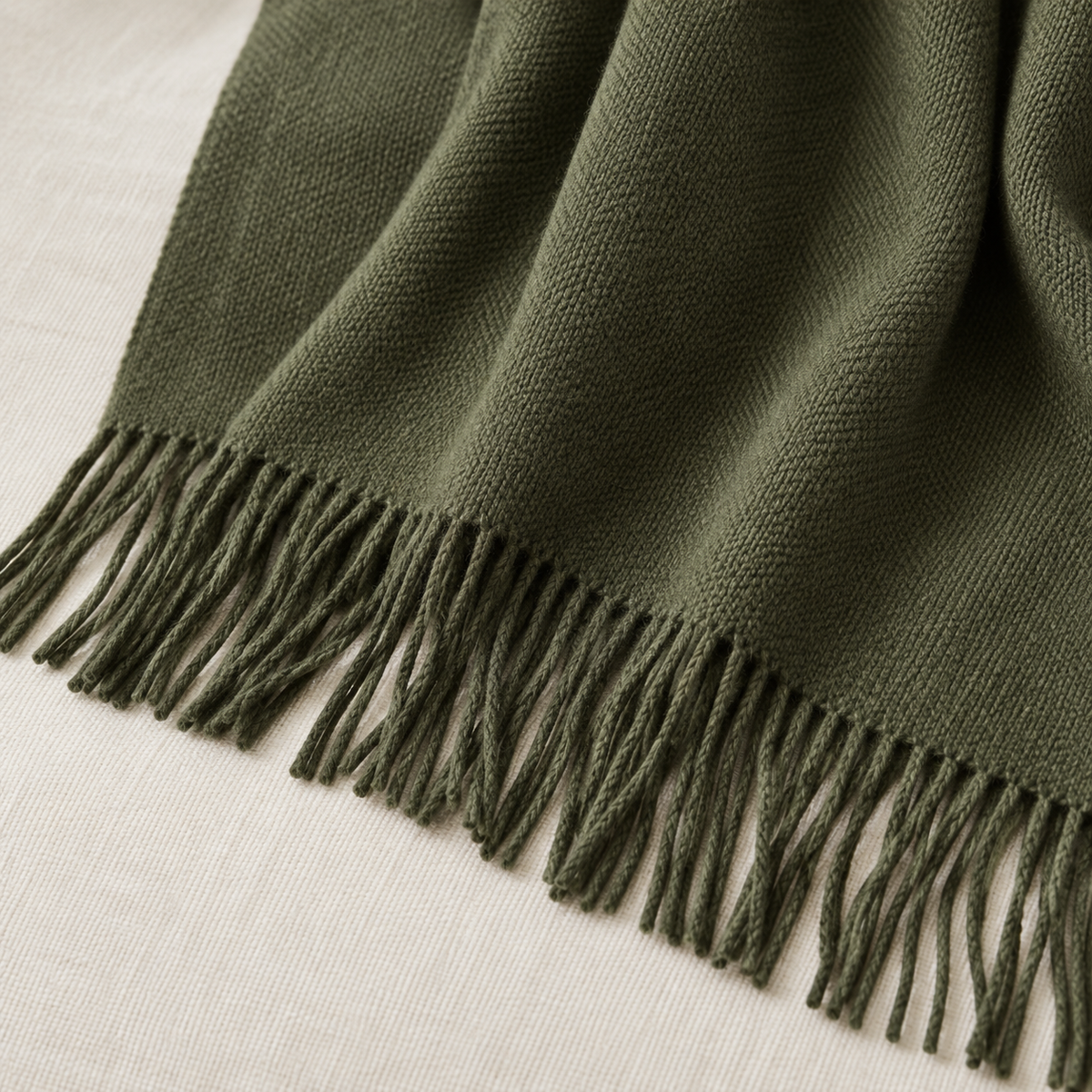 Della Olive Green Fine Knit Tasselled Throw Blanket – fabric detail 3