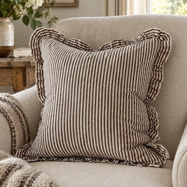 Darcy chocolate brown pinstripe cushion cover styled in a warm country interior