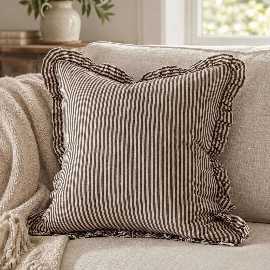 45cm Darcy chocolate brown pinstripe cushion cover with ruffle edge styled on seating