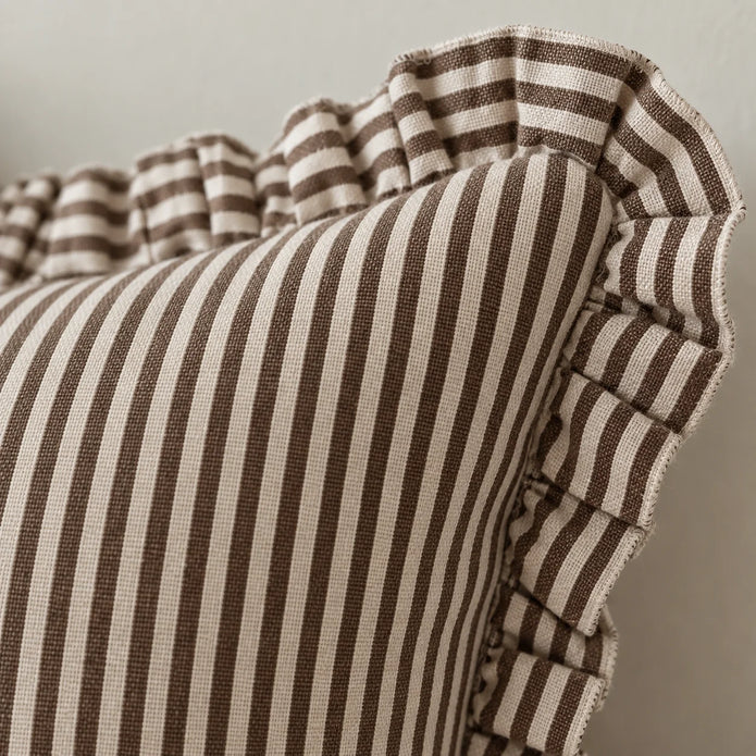 Close-up of Darcy chocolate brown pinstripe cushion cover fabric and ruffle edge