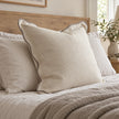 Chloe cream and greige 65 × 65 cm extra large bed cushion cover – styled on a bed, view 2
