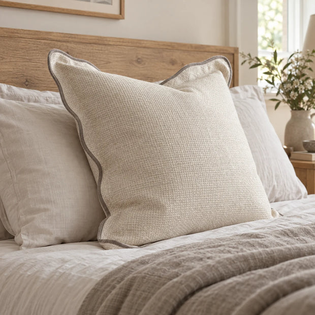 Chloe cream and greige 65 × 65 cm extra large bed cushion cover – styled on a bed, view 2