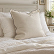 Chloe cream and greige 65 × 65 cm extra large bed cushion cover – styled on a bed, view 3