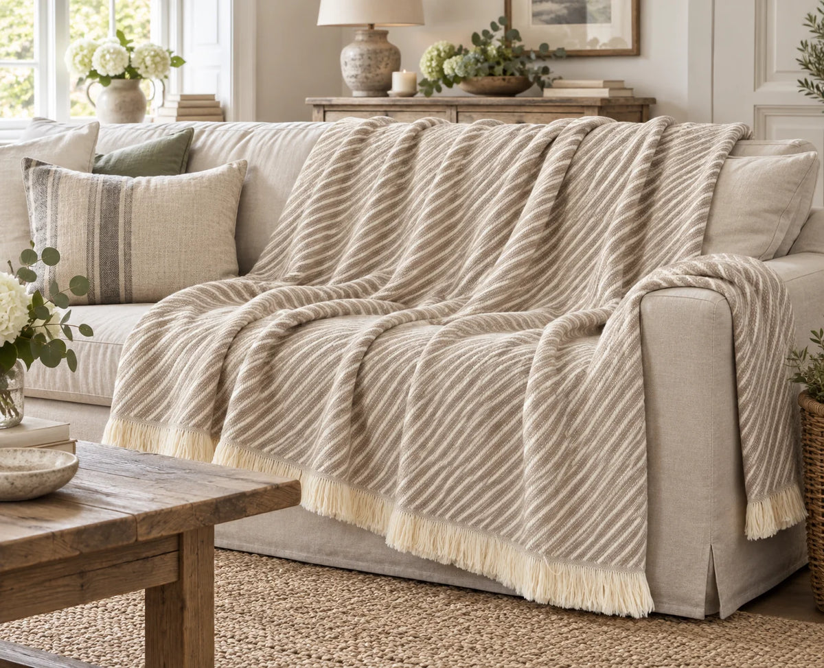 Ellenvale beige striped throw blanket from Ellenvale Trade, soft and cozy with a subtle striped pattern, perfect for home decor.