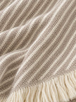 Beige striped Ellenvale Trade throw blanket made of soft furnishings material, displayed folded on a neutral background.