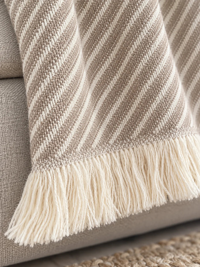 Ellenvale beige striped throw blanket from Ellenvale Trade, soft furnishings with cozy, woven fabric and subtle stripe pattern.