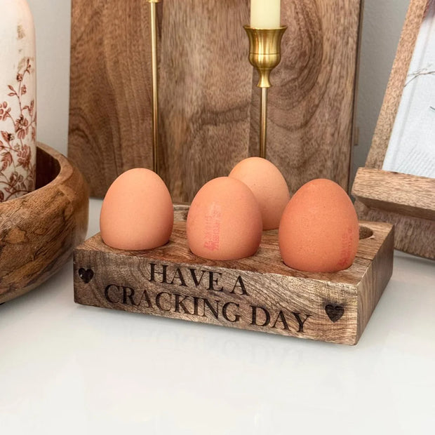Wooden Egg Holder 'Cracking Day', wooden Cracking Day egg holder in a kitchen display