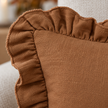 Rust brown linen blend cushion cover with frilled edges and rectangular shape from Ellenvale Trade's Hallie collection.