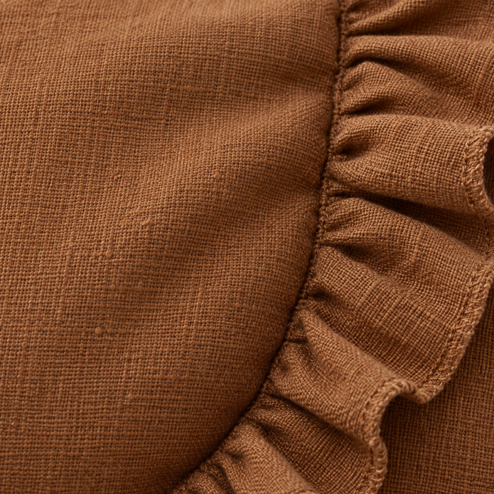 Rust brown linen blend cushion cover with frilled edges from Ellenvale Trade, designed for soft furnishings.