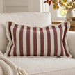 Ellenvale Chloe burgundy rectangle scalloped cushion cover styled on a sofa