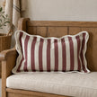 Ellenvale Chloe burgundy rectangle scalloped cushion cover on a country bench
