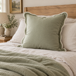 Chloe sage green 65 × 65 cm extra large bed cushion cover – styled on a bed, view 2