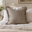 Darcy chocolate brown 65 × 65 cm extra large bed cushion cover – styled on a bed, view 3