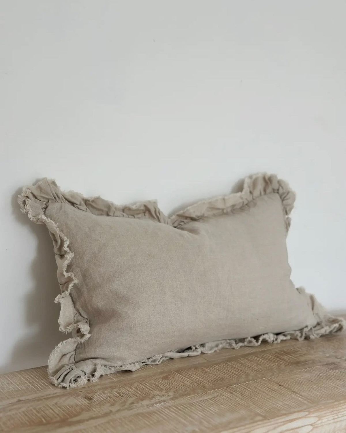 Beige luxury linen cushion cover with ruffled edge, soft furnishings by Ellenvale Trade for elegant home decor.