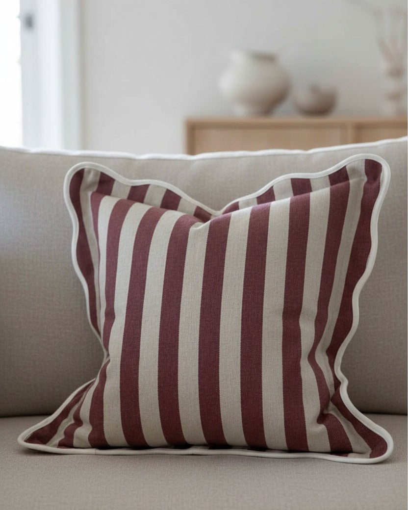 Chloe Burgundy square cushion cover with stripe and scalloped edges, soft furnishing by Ellenvale Trade, shown on a cushion.