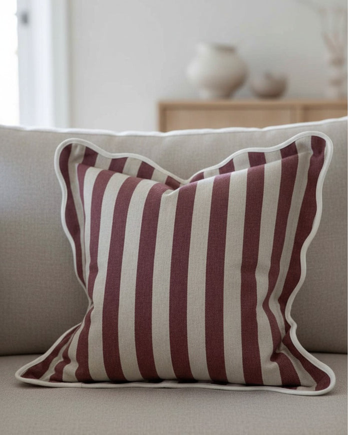 Chloe Burgundy square cushion cover with stripe and scalloped edges, soft furnishing by Ellenvale Trade, shown on a cushion.