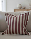 Chloe Burgundy square cushion cover with stripe and scalloped edges, soft furnishing by Ellenvale Trade, shown on a cushion.