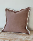 Dusty pink square scalloped cushion cover by Ellenvale Trade, soft furnishings accessory with decorative scalloped edges.