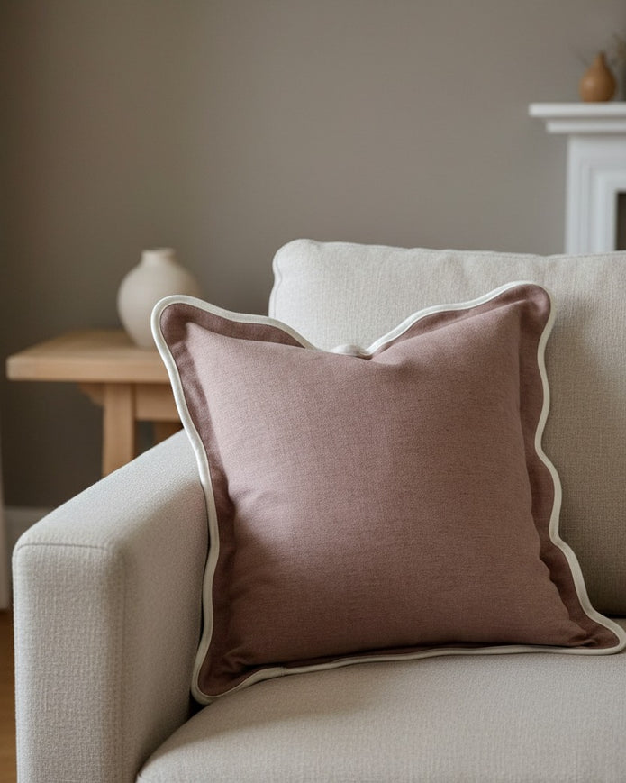 Dusty pink Chloe square scalloped cushion cover by Ellenvale Trade, soft furnishings with elegant scalloped edges.